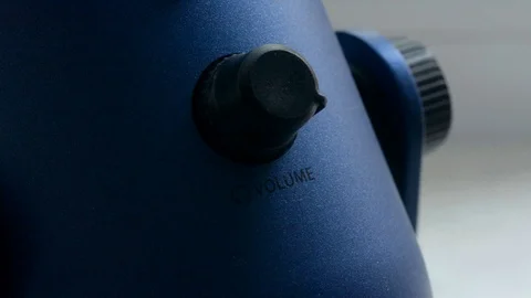 Man's Hand Turns Up Volume on microphone Stock Footage 110726039