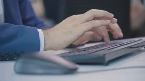 A man's hand is typing on the keyboard close-up plan Stock-Footage 164809396