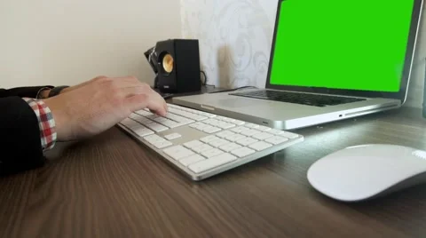 A man's hand typing on a keyboard pc Green screen Stock Footage 57494476