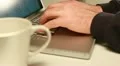 Man's hand typing on laptop HD Footage
