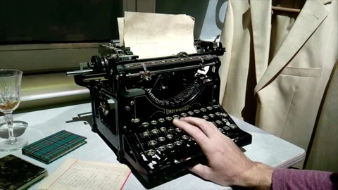 Man's hand typing on old type writer machine Stock Footage 118994894