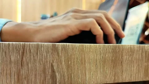 Man's hand using computer mouse in office while working. Stock Footage 289921899