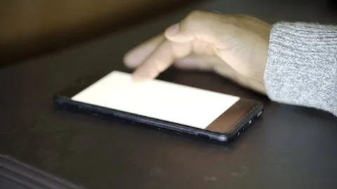 Man's hand using his cell phone in the dark blank screen Stock Footage 272254947