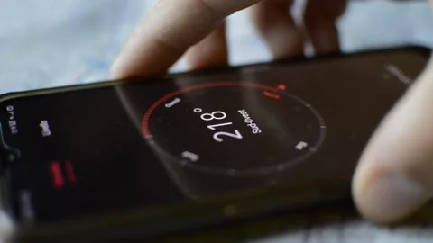 Man's hand using phone compass and map for travel 스톡 동영상 201409762