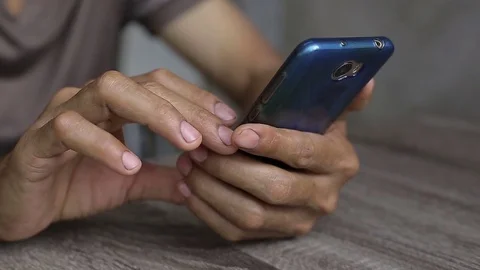Man's hand using smartphone. Stock Footage 80979013