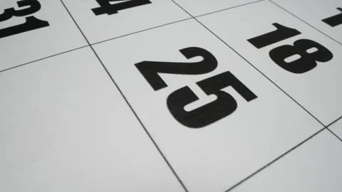 Mans hand Write down the all day on the paper calendar using a red pen. Very Video stock 312047488