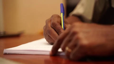 Mans Hand Writing Notes With Pen Into A notebook. Stock Footage 321276051