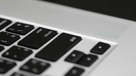 Man's hand Press enter button on the computer keyboard Stock Footage 87193534