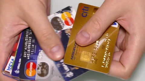Man's hands are sorting credit cards Stock Footage 47155970