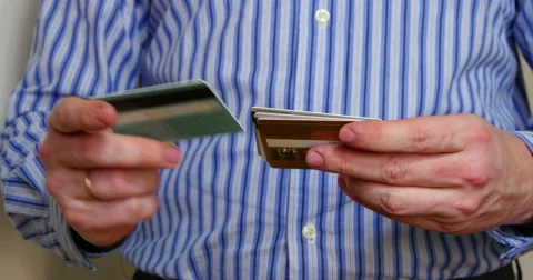 Man's Hands Are Sorting Credit Cards 4k Stock Footage 47840521