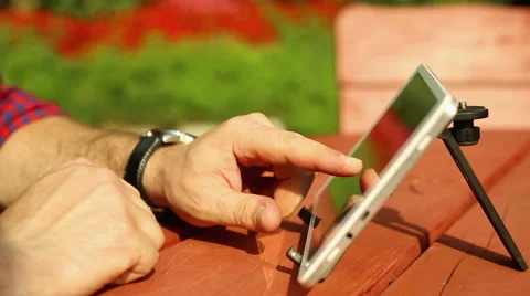 Man's hands are touching tablet Video stock 65819273