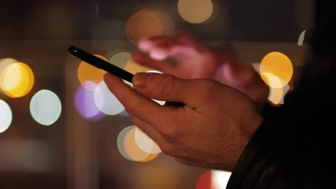 Man's hands are typing a message on the phone Stock Footage 143877357