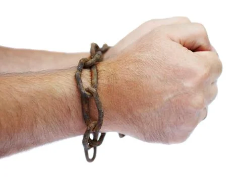 Man's hands chained in a chain Foto stock