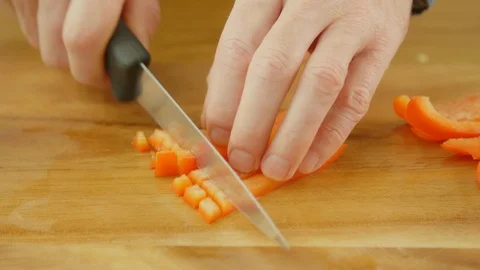 Man's Hands Chopping Red Bell Pepper On Cutting Board Stock Footage 86068930