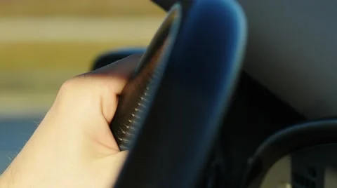 Mans hands close up making steering wheel rotation driving on turn Stock-Footage 45608723