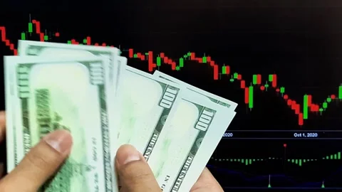 Man's hands count dollar bills on the background of a laptop Stock Footage 289201107
