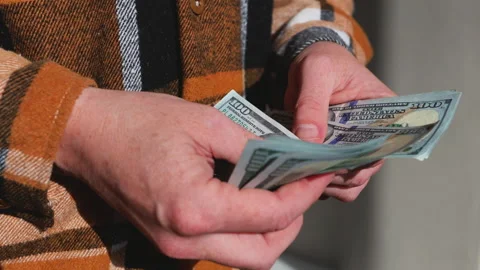 Man's Hands Counting Dollar Bills Stock Footage 313342882