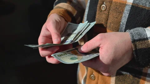 Man's Hands Counting Dollar Bills Stock Footage 313342956