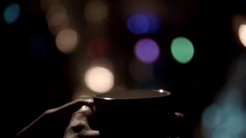 Man's hands cup of tea coffee tilt down Stock Footage 69269958