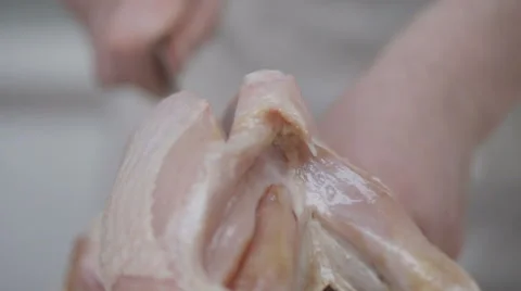 Man's hands cut chicken knife Stock Footage 68721352