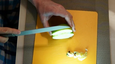 Man's hands cutting the apple. Man cuts an apple Stock Footage 86465283