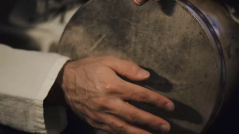 Man's hands drumming out a beat on an arabic percussion drum named Tombak Stock Footage 74523629