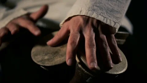 Man's hands drumming out a beat on an arabic percussion drum named Kasoureh Video stock 74527039