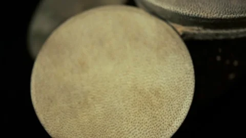 Man's hands drumming out a beat on an arabic percussion drum named Kasoureh Video stock 74527098