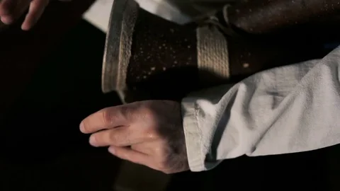 Man's hands drumming out a beat on an arabic percussion drum named Kasoureh Video stock 84772741