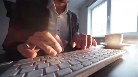 Man's hands in elegant suit keyboarding on laptop computer Видео 56204396