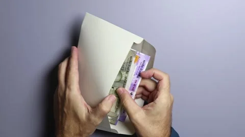 Man's hands, envelope and Indian rupees (INR) cash money banknotes. Stock Footage 303341596