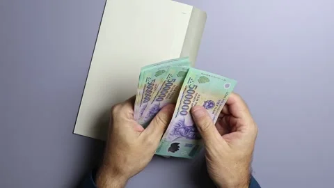 Man's hands, envelope and Vietnamese dong (VND) cash money banknotes. Stock Footage 303341276