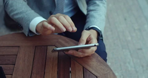 A man's hands filmed almost using the tablet and surfing the internet. Stock Footage 139966006