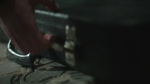 Man's hands folding violin into case and takes away. Stock Footage 107793821