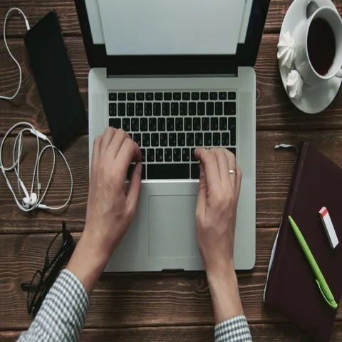 Man's hands on keyboard of laptop Stock Footage 69617895