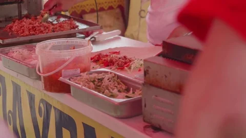 Man's hands make doner kebab adding fried meet and vegetables Stock Footage 78241284