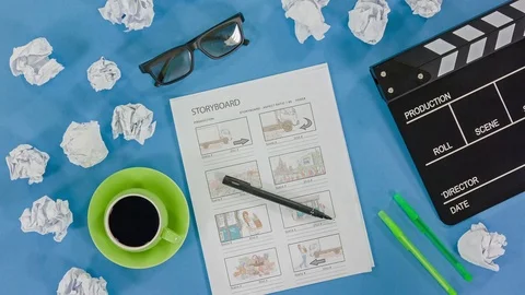 The man's hands make notes in the storyboard, in the final paper is crumpled. 스톡 동영상 77374277