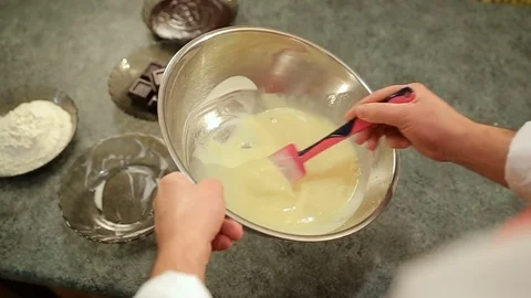 Man's hands mixing liquid batter for crepes or cake Stock Footage 81901227