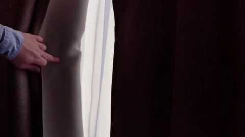 The man's hands open the curtains. Stock Footage 169067144