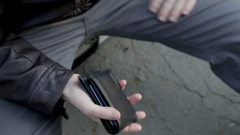 A man's hands open his wallet and find it empty Stock Footage 102282683