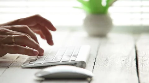 Man's hands on the PC keyboard with mouse on foreground Stock-Footage 51565474