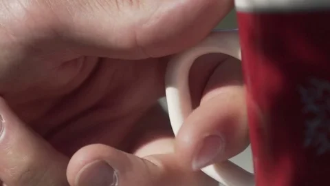 Man's hands picking up the coffee cup Stock Footage 76003268