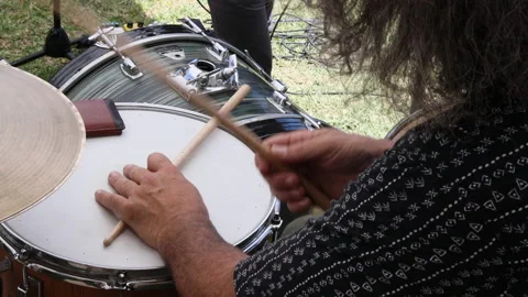 Man's hands playing drum cymbal outdoors. Handheld shot. Stock Footage 197291062