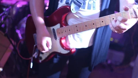 Mans hands playing electro guitar on wedding party. Stock Footage 107882319