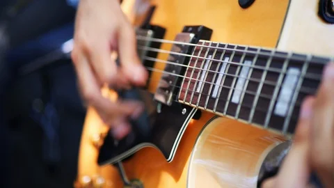 Man's hands playing the funky rhythm on electric guitar Stock Footage 116769737
