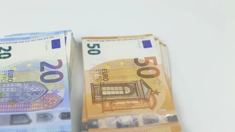 A man's hands put banknotes on a table of one hundred, twenty, fifty euros of Video stock 208076871