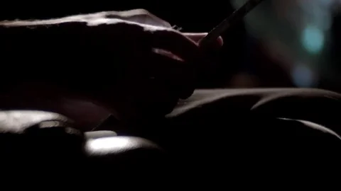 Man's hands scrolling tablet night tilt up Video stock 69271883