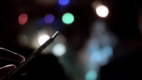 Man's hands scrolling tablet night pan Stock Footage 69272407