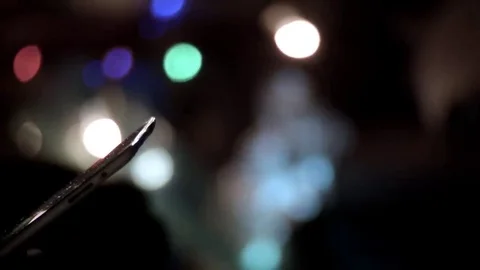 Man's hands scrolling tablet night pan Stock Footage 69272575