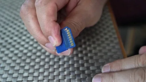 Man's hands with SD card Stock Footage 85019093